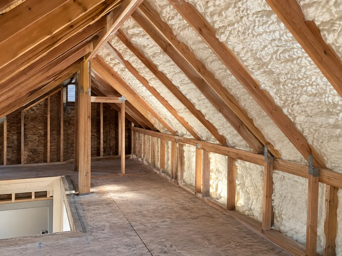 Illustration of intersecting attic roof slopes with selected insulated bays and visible boundary connections