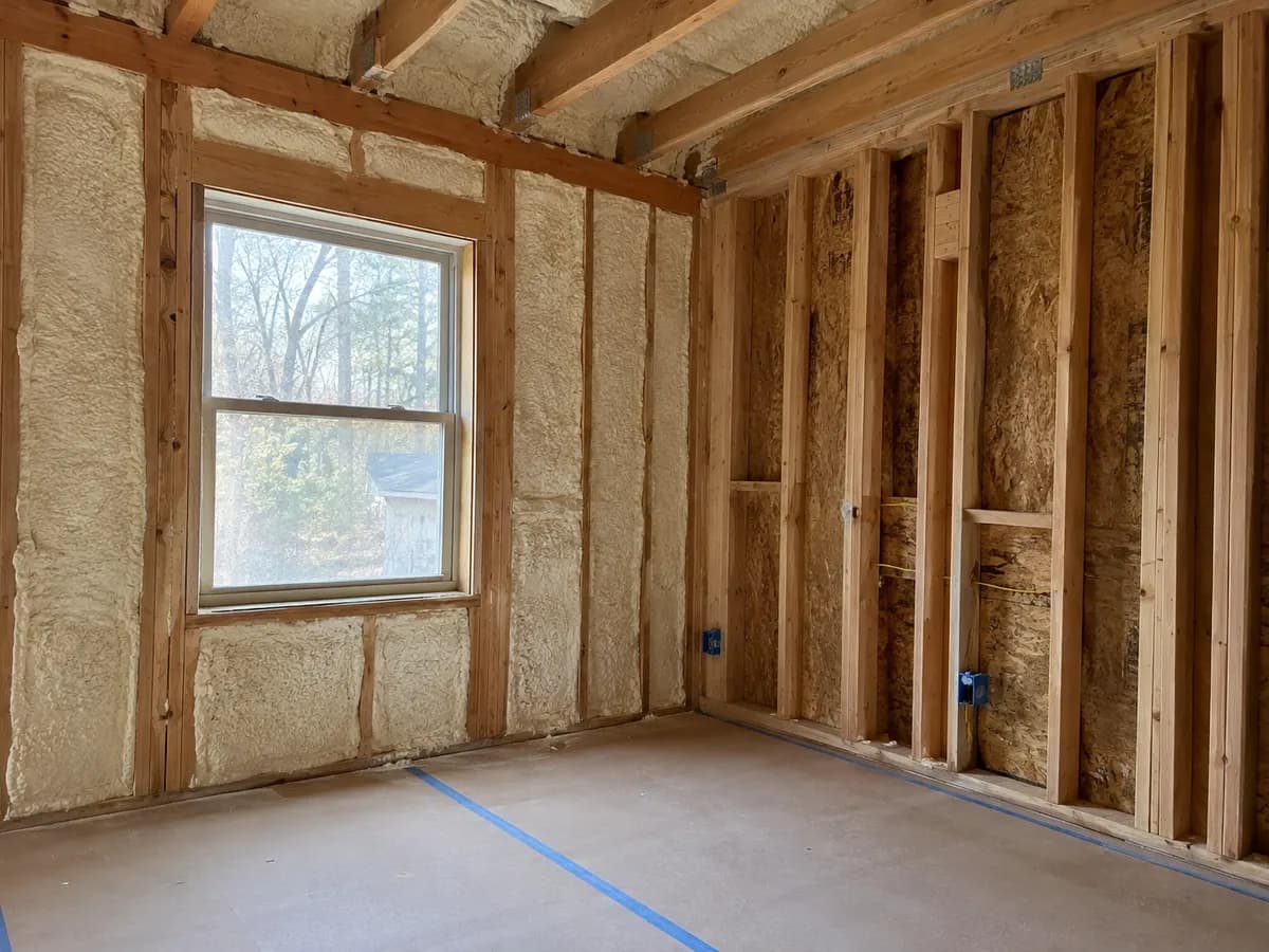 Illustration of open residential wall cavities during a finished-room renovation